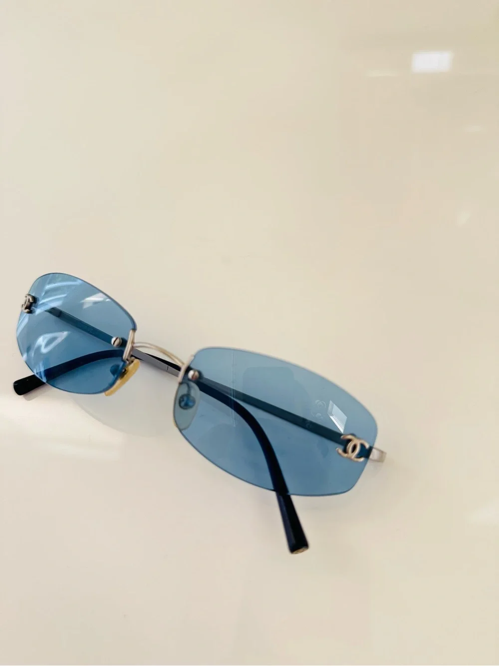 RARE 💫 vintage Chanel blue rimless sunglasses.